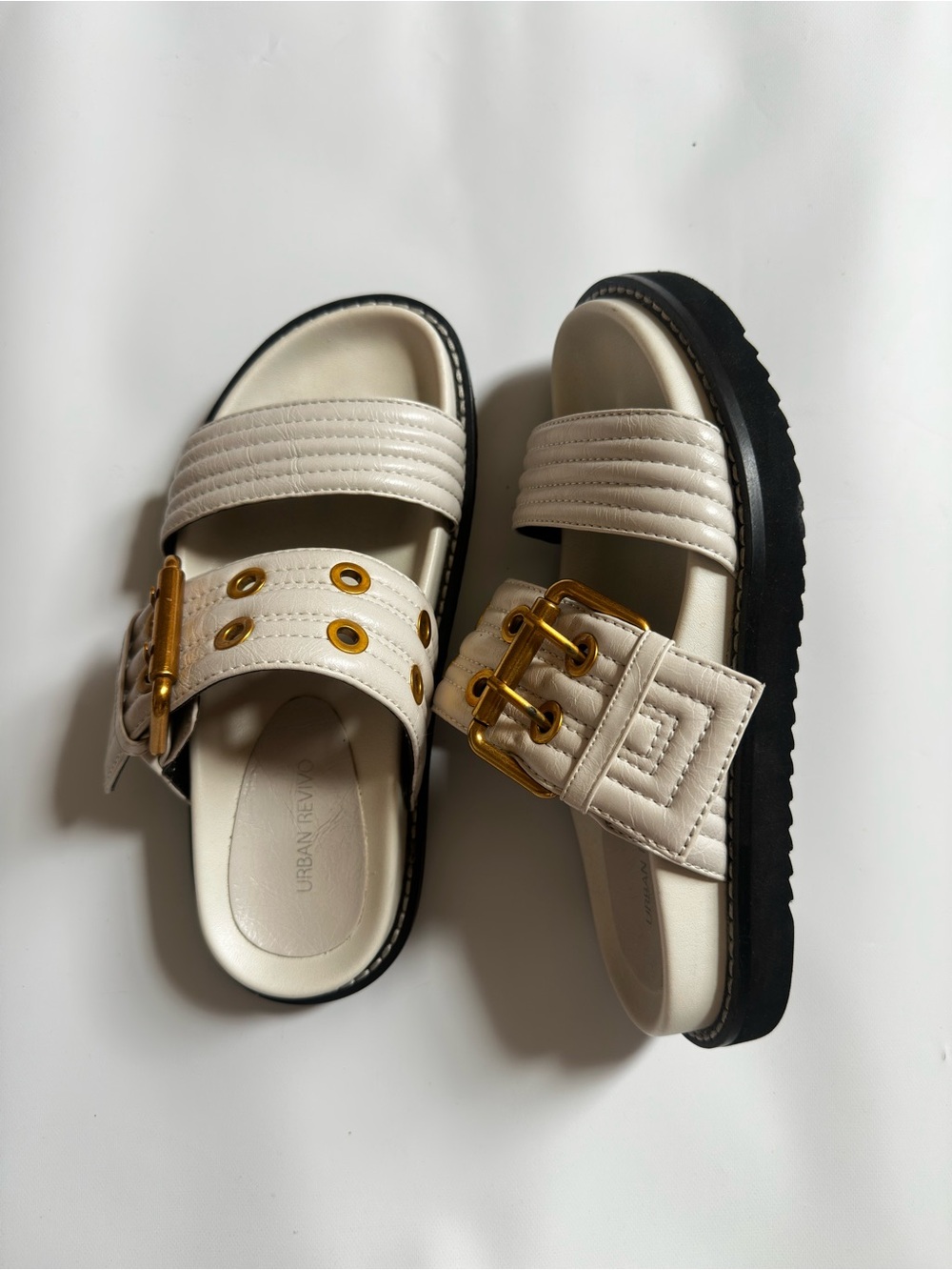 Cream Slide Sandals with Gold Buckle Accents